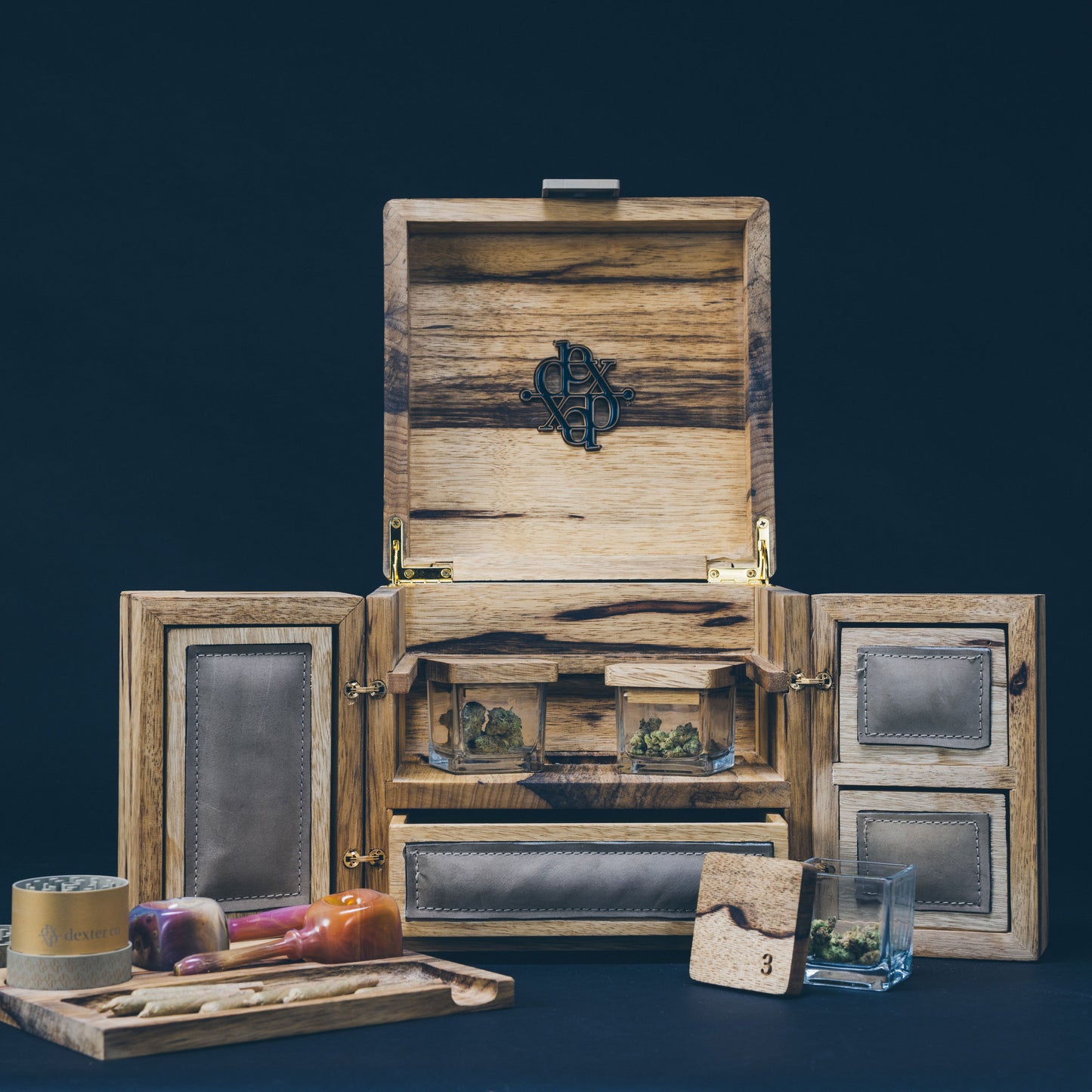 Dexter 10" Cube in Black Limba, showcasing luxurious, handcrafted storage with integrated design and premium accessories.