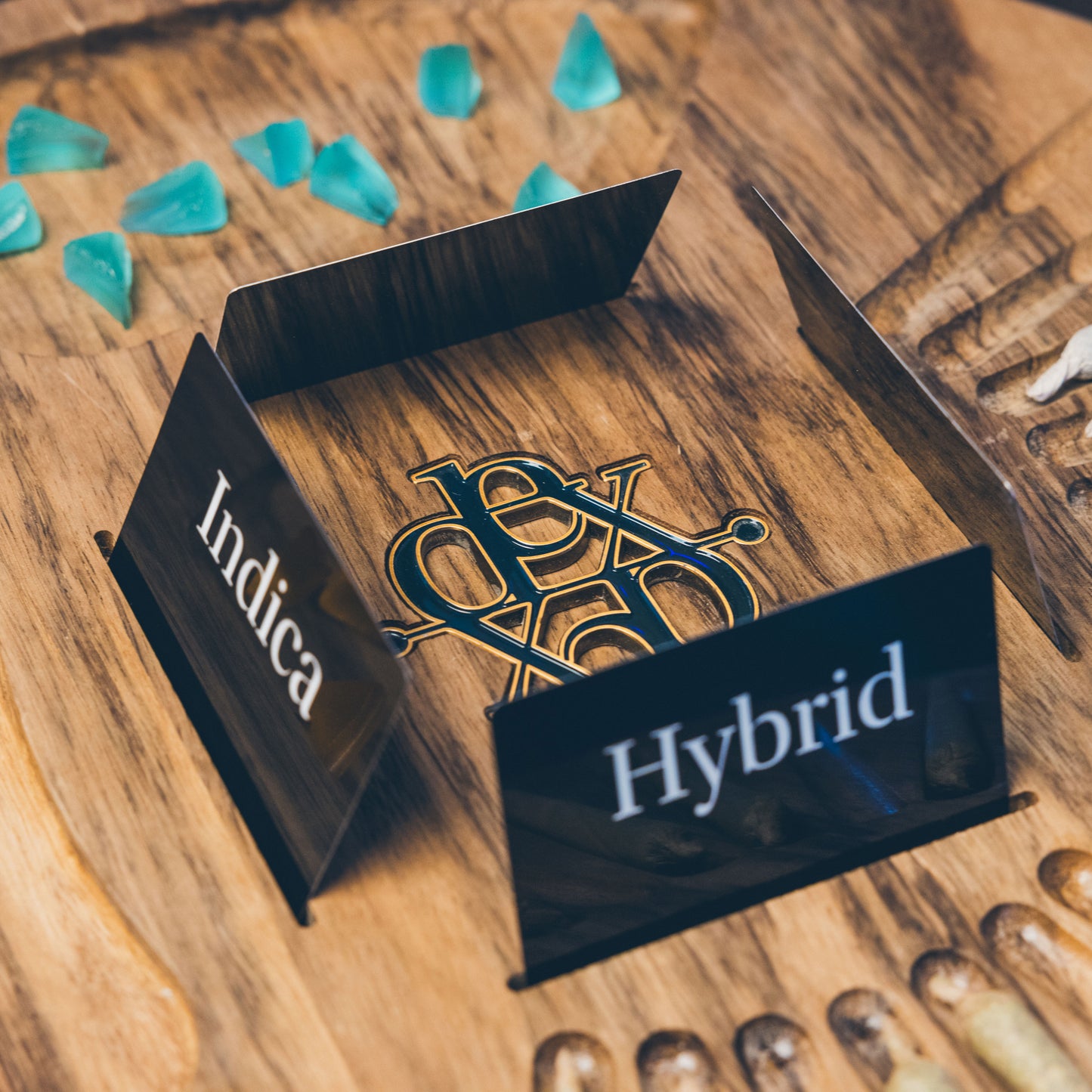 
                  
                    Lazy Dexter Joint and Edible Serving Tray showing Indica and Hybrid labels with decorative stones.
                  
                