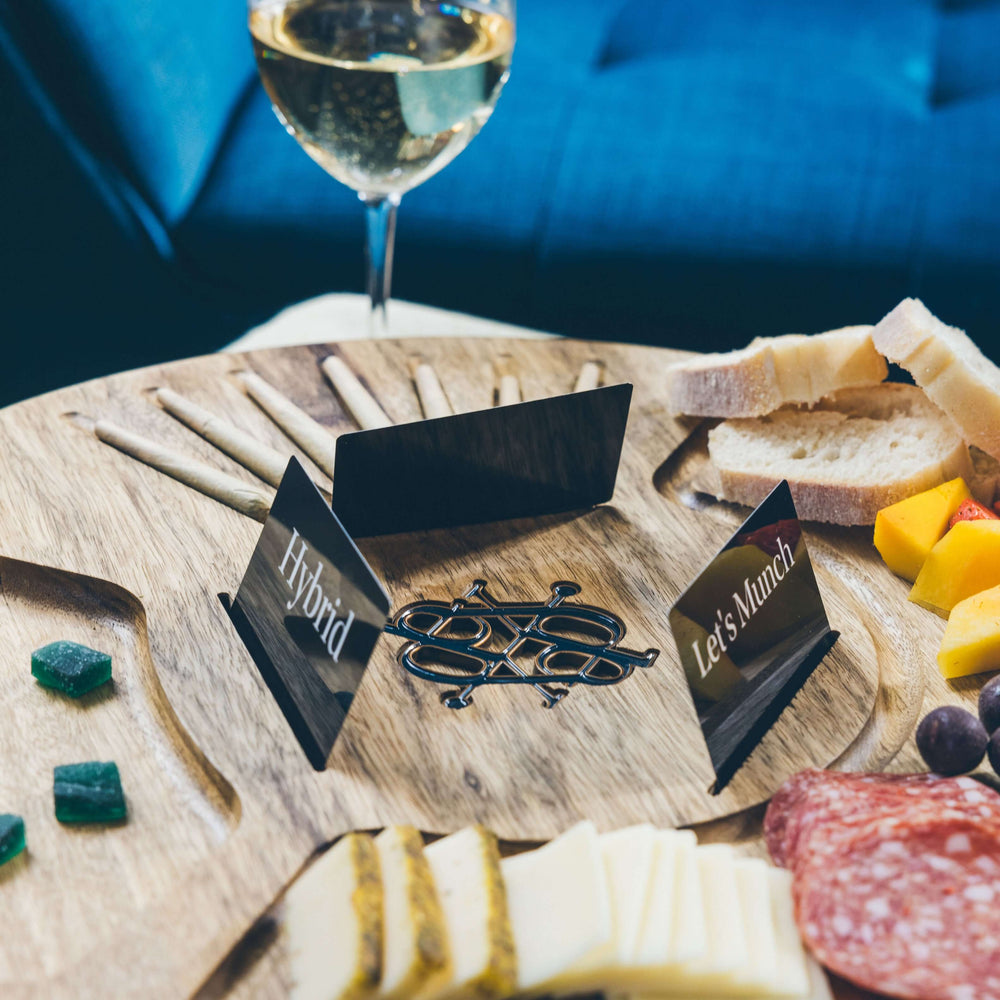 Lazy Dexter luxury serving tray featuring stylish labels for Hybrid and Let's Munch, elegantly arranged gourmet foods.