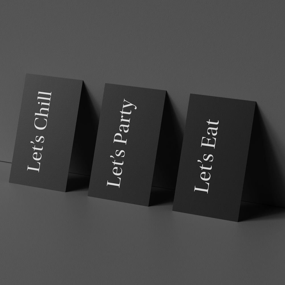
                  
                    Black table signs with 'Let's Chill', 'Let's Party', and 'Let's Eat' for stylish entertaining.
                  
                